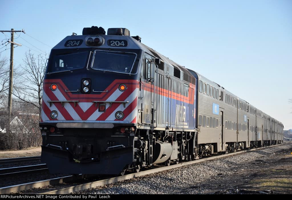 Inbound commuter shoves east out of the station